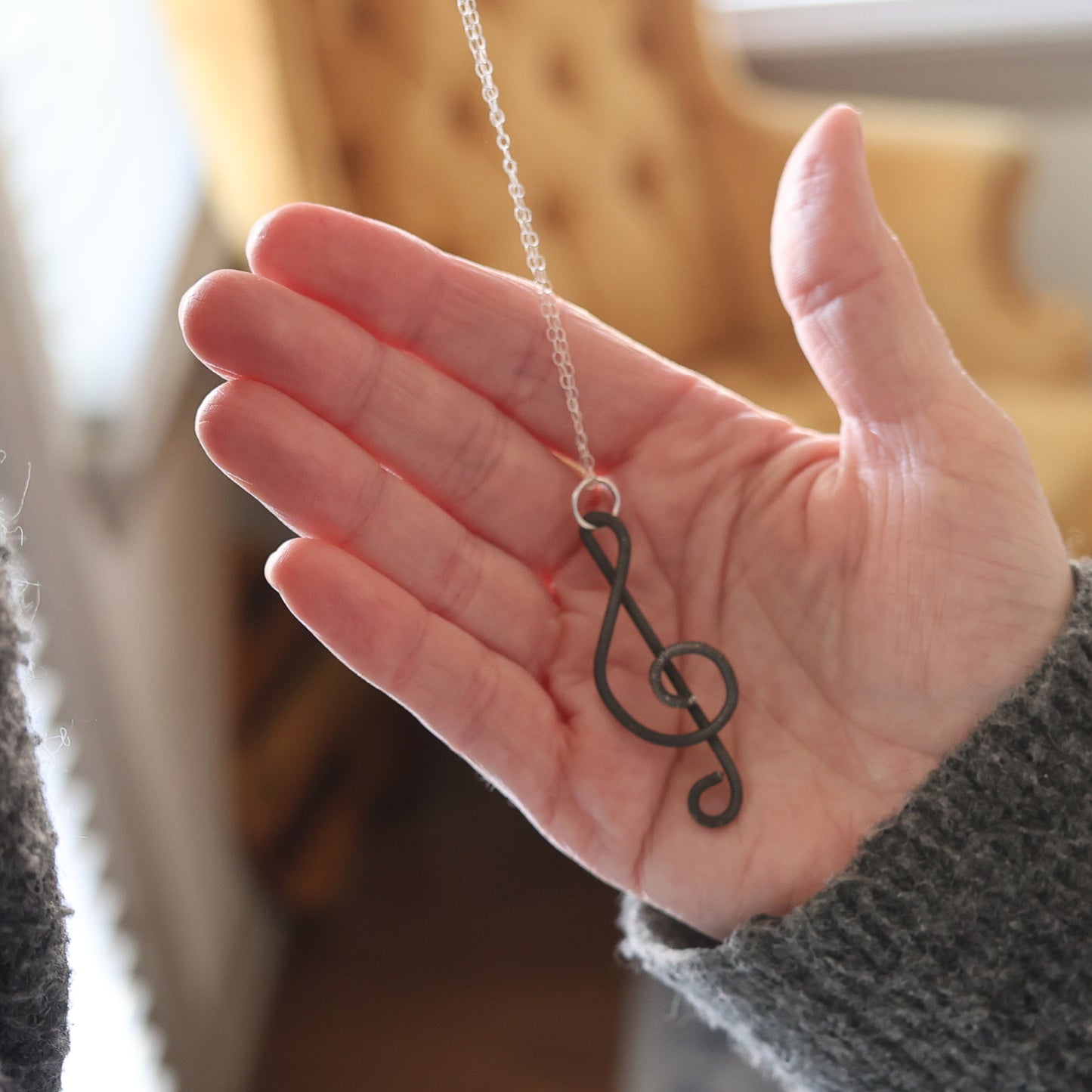 Piano Wire Treble Clef Necklaces