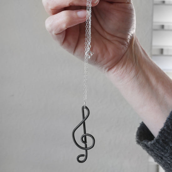 Piano Wire Treble Clef Necklaces