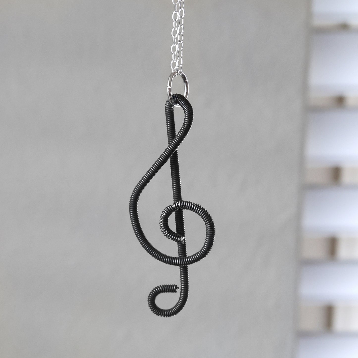 Piano Wire Treble Clef Necklaces