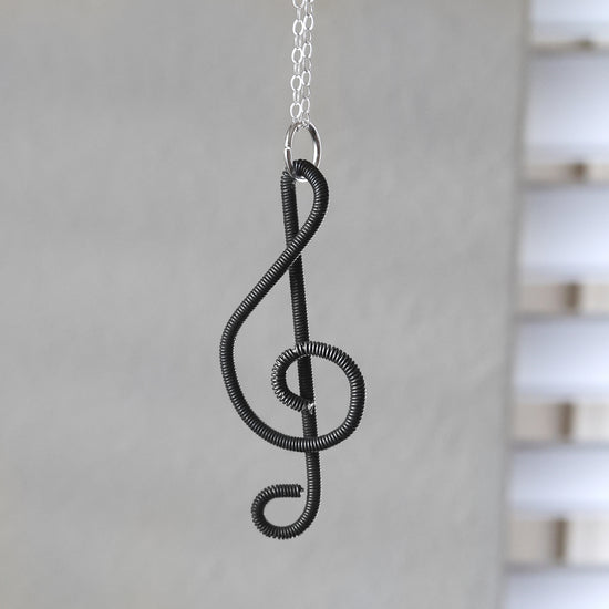 Piano Wire Treble Clef Necklaces